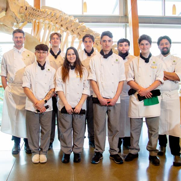 Students and chef posing at sturgeon challenge