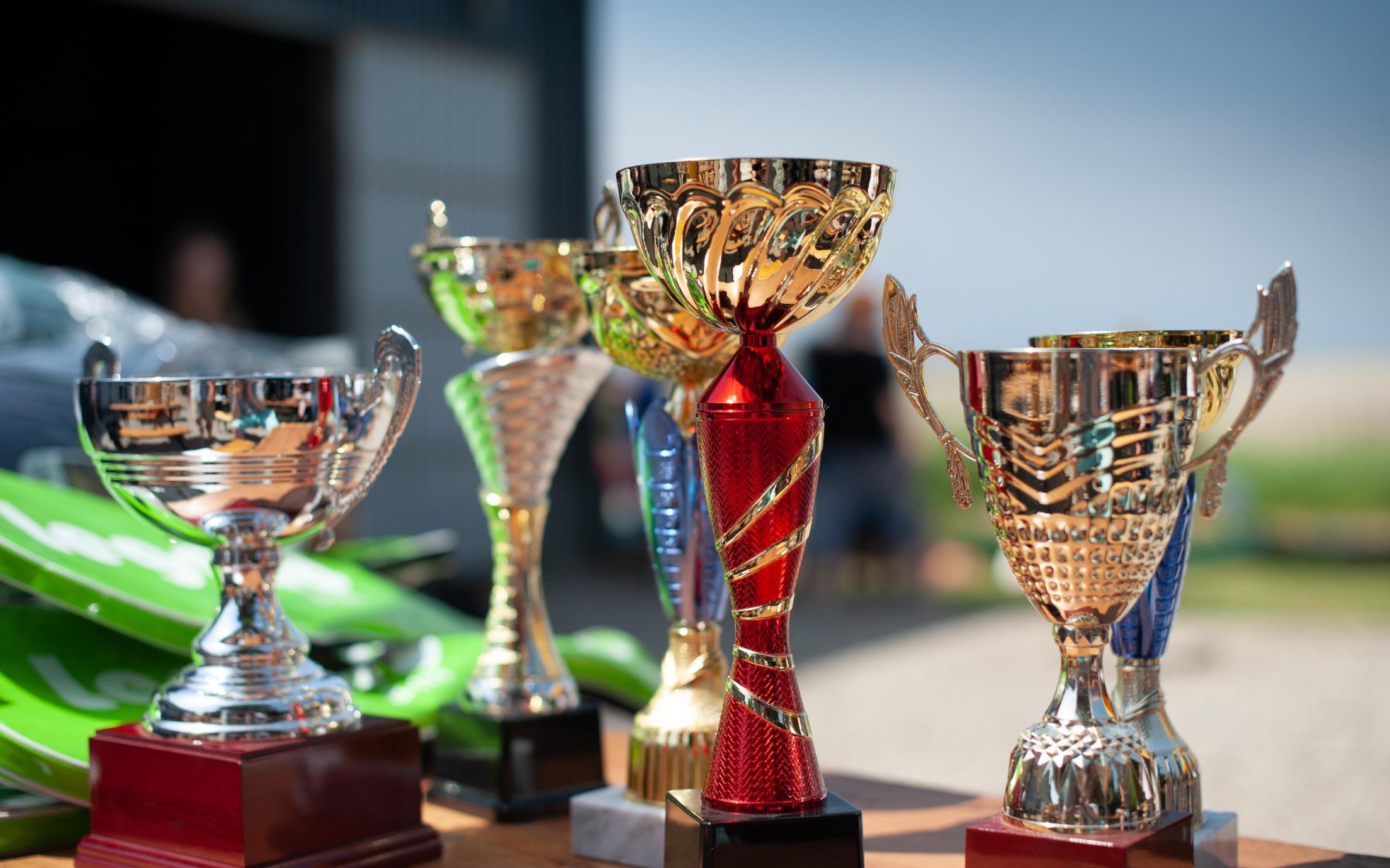 Four trophies of various sizes 