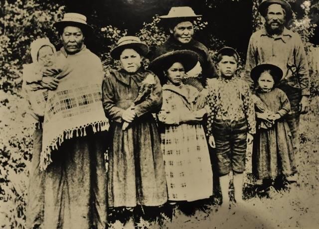 Group of people, likely family, from likely early 1900s from QFN