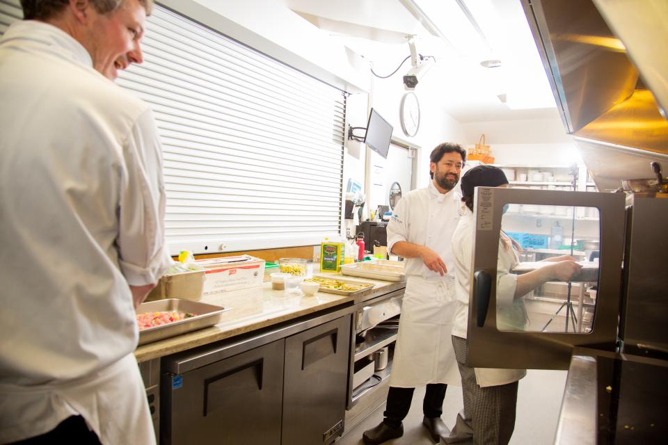 Chefs working in kitchen