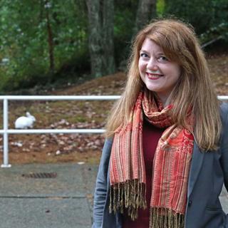 Patricia Elliott standing outside