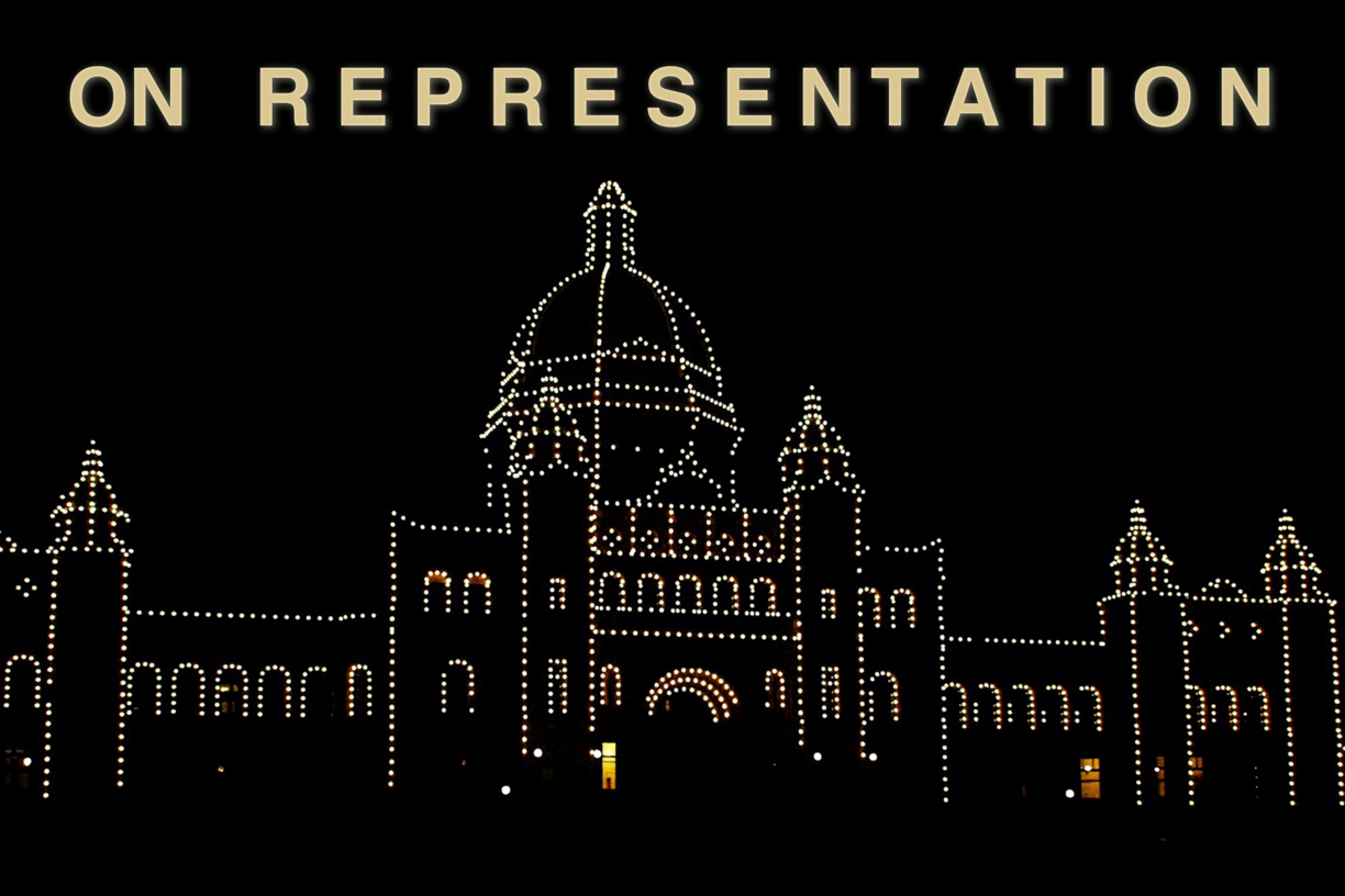 BC Parliament building illuminated in the dark